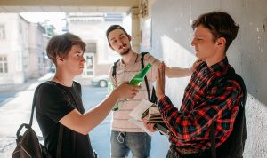 teenager refusing an offer of alcohol